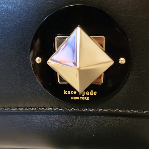 kate spade Handbags - Kate Spade Black and Gold Shoulder Bag with Leopard Zip Opt & Geometric Closure